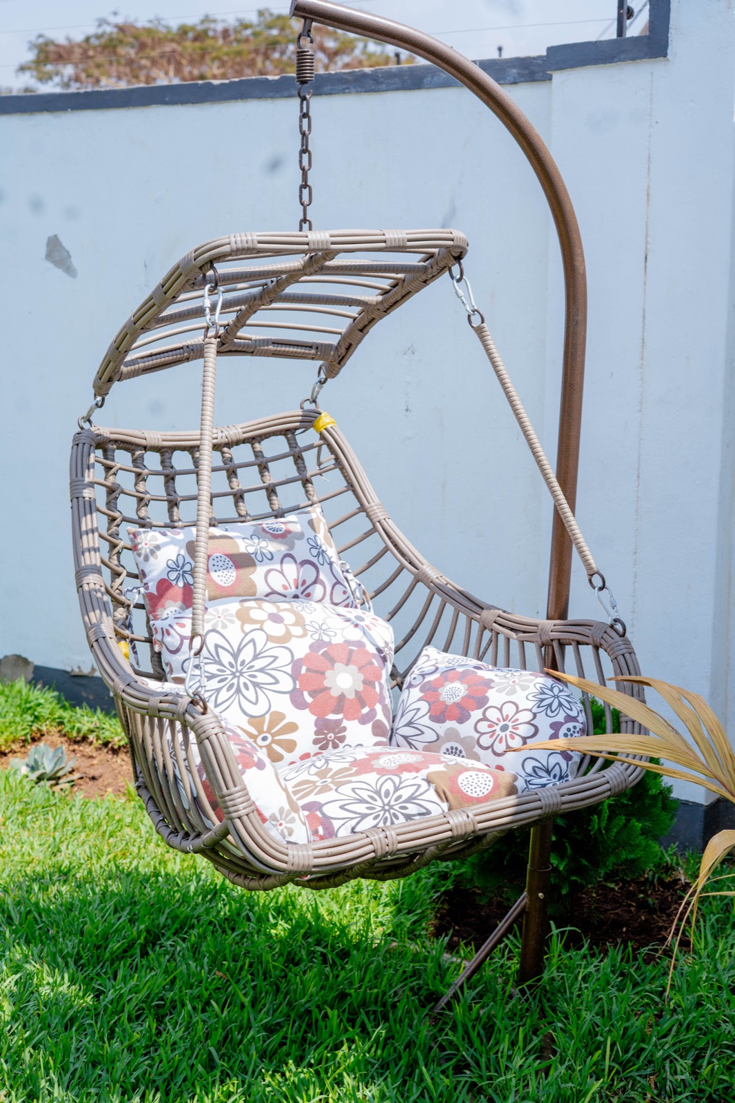 Hanging swing chair in the garden at Nichi Guesthouses
