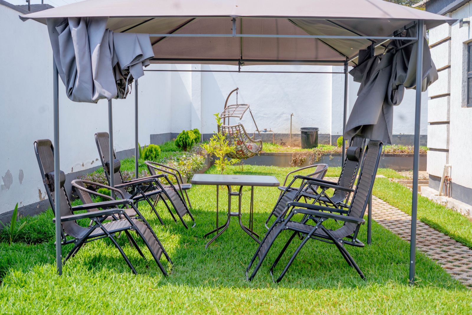 Outdoor gazebo sitting area at Nichi Guesthouses
