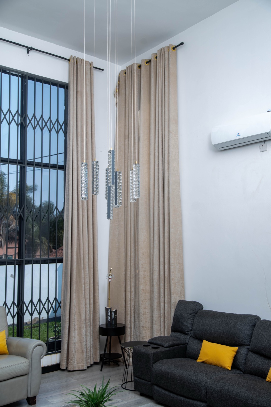Living room with statement pendant lighting at Nichi Guesthouses