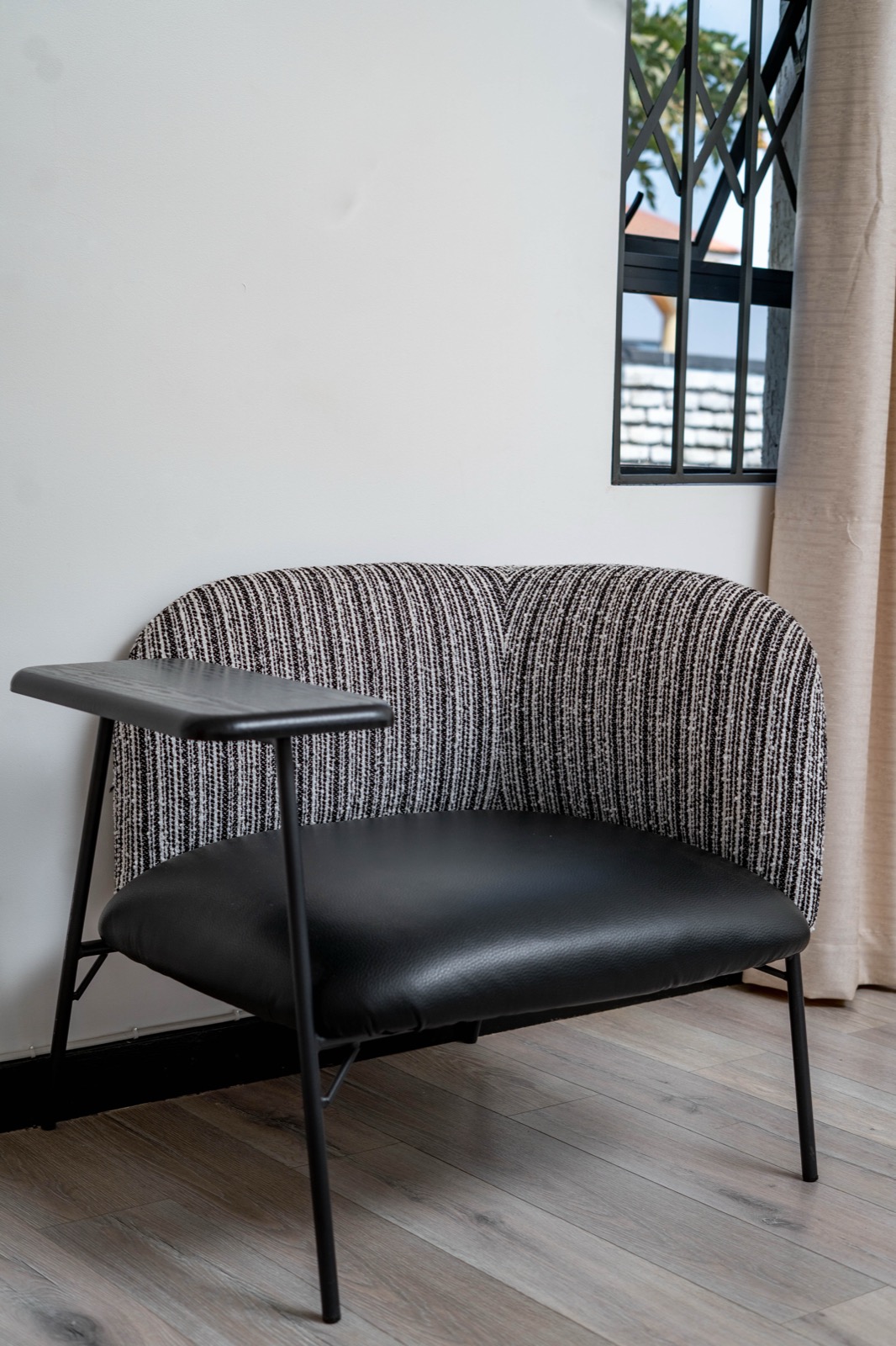 Styled accent chair at Nichi Guesthouses