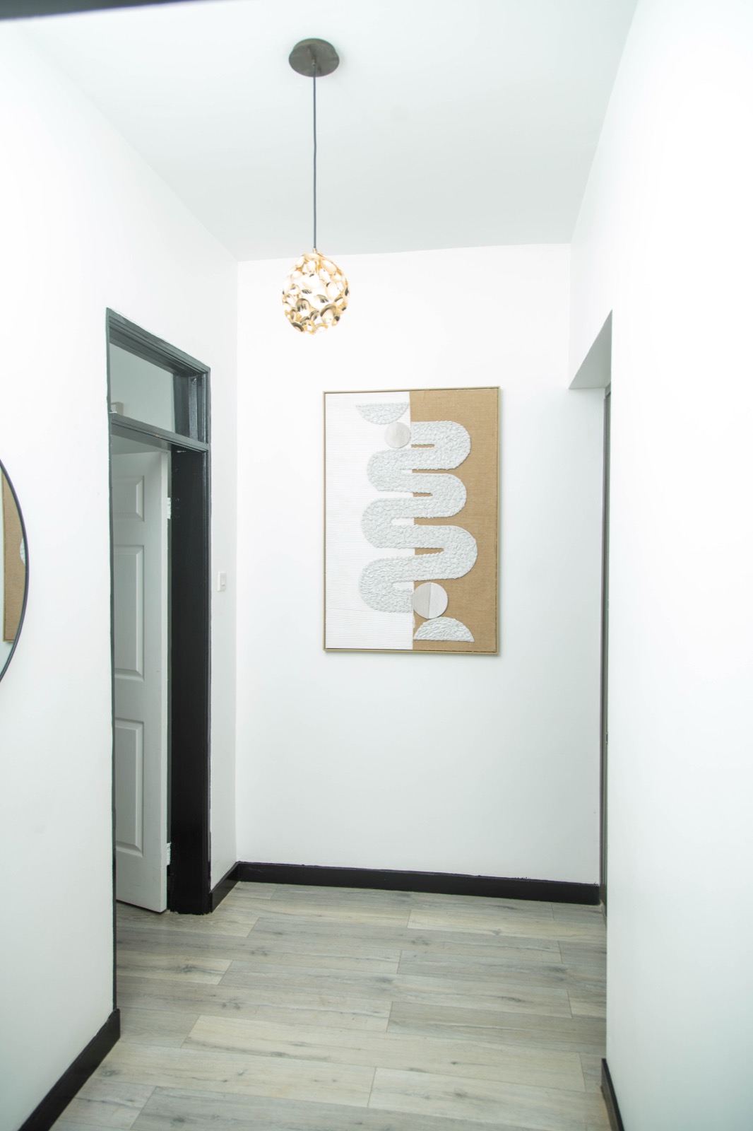 Interior corridor leading to the dining space at Nichi Guesthouses